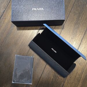 Prada's Elegant Black Glasses Case